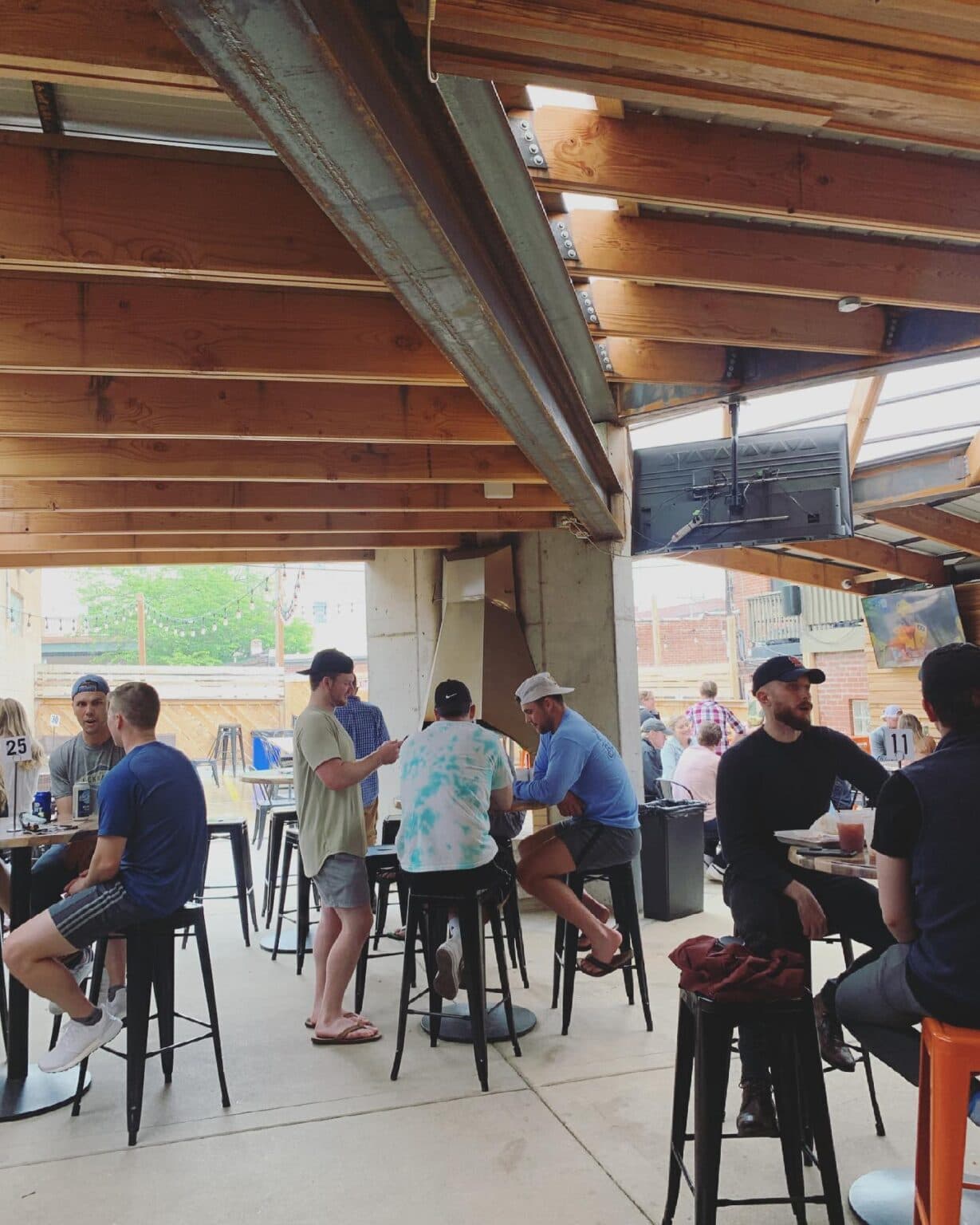 Afternoon crowd under the open patio roof