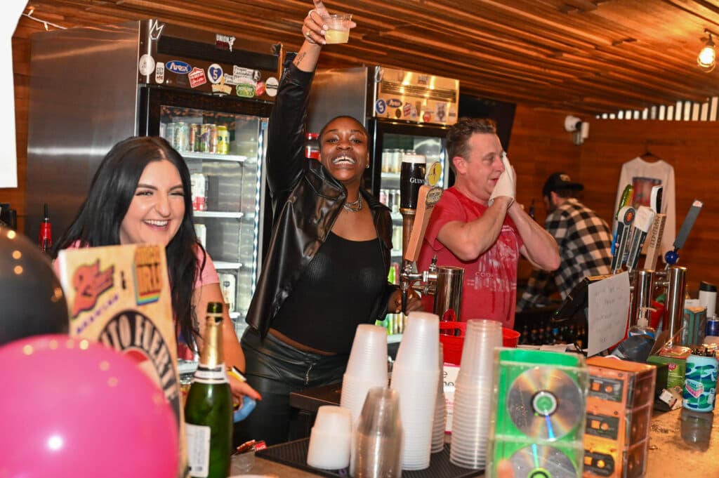 Toast from behind the bar, champagne on ice