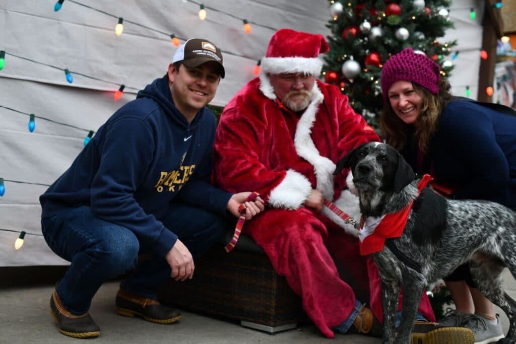 Family photo with Santa by the tree