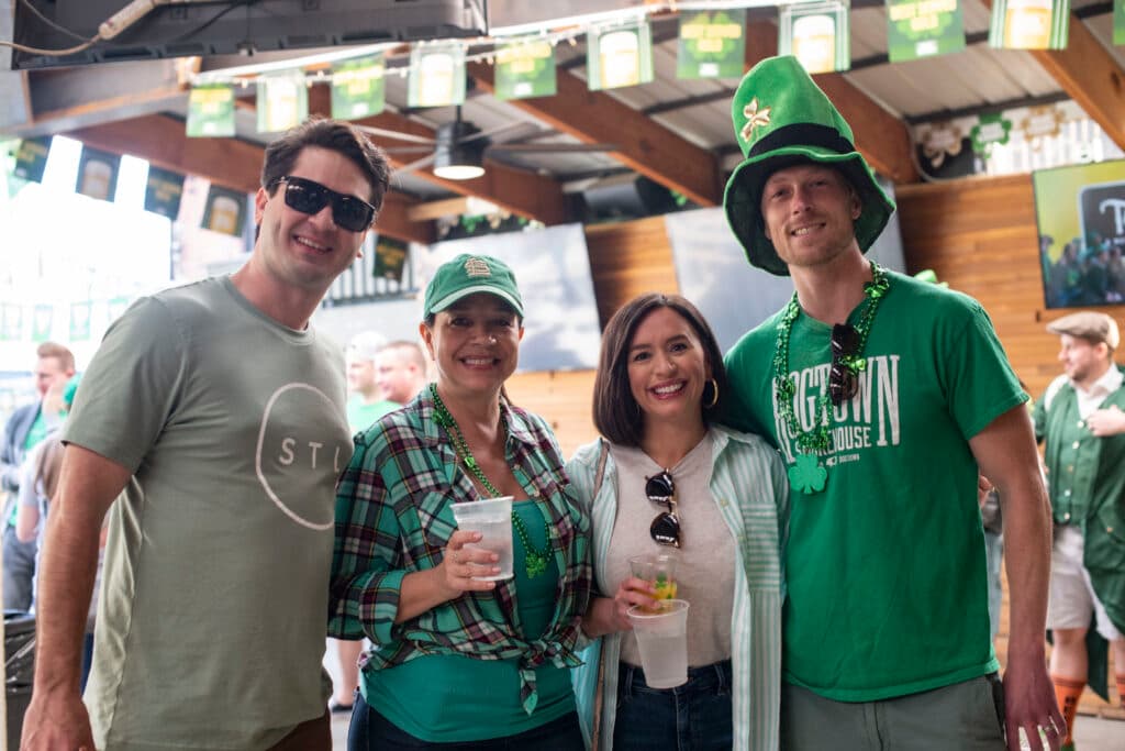 The crew in green under the patio TVs