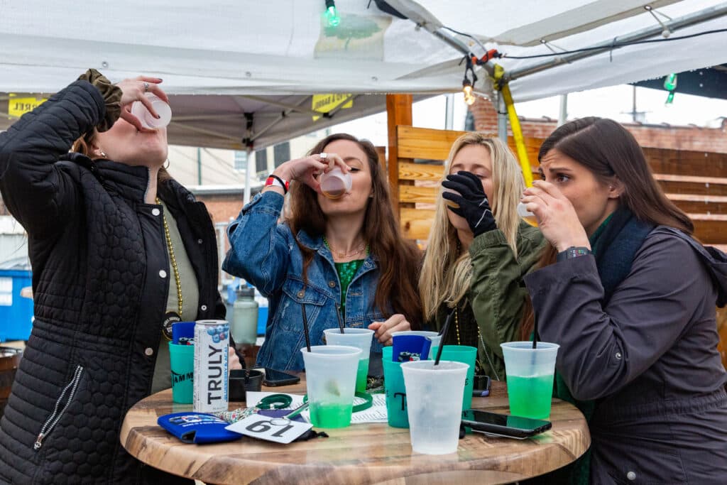A round of shots under the patio tent